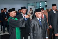 Amiruddin Abd. Hamid saat diambil sumpah/janji jabatan.